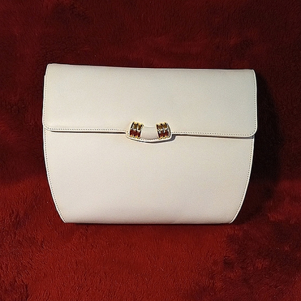 Salvatore Ferragamo white leather handbag.